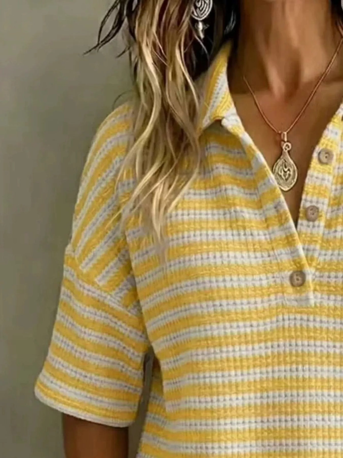 Plus size contrast striped knit polo shirt by Trendsi, featuring a classic collar and short sleeves, styled as a casual tops.