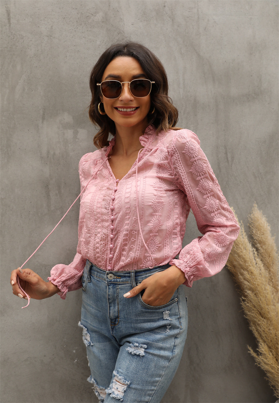 Bella Mia women's long sleeve V-neck shirt with floral embroidery and wood earrings detail, perfect for stylish casual wear.