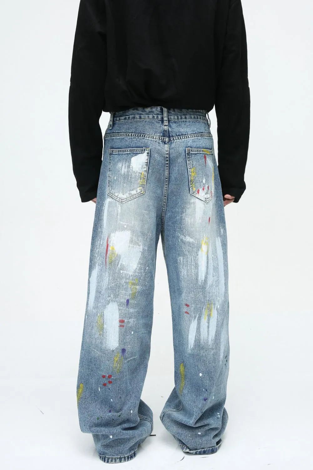 Plush Fashion Hub denim jeans with colorful painted design and functional pockets, stylish casual pants for everyday wear.
