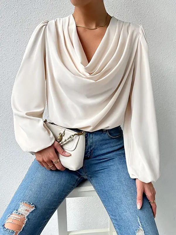 Bella Mia long sleeved loose draped V-neck top for women, casual T-shirt with relaxed fit and stylish design.