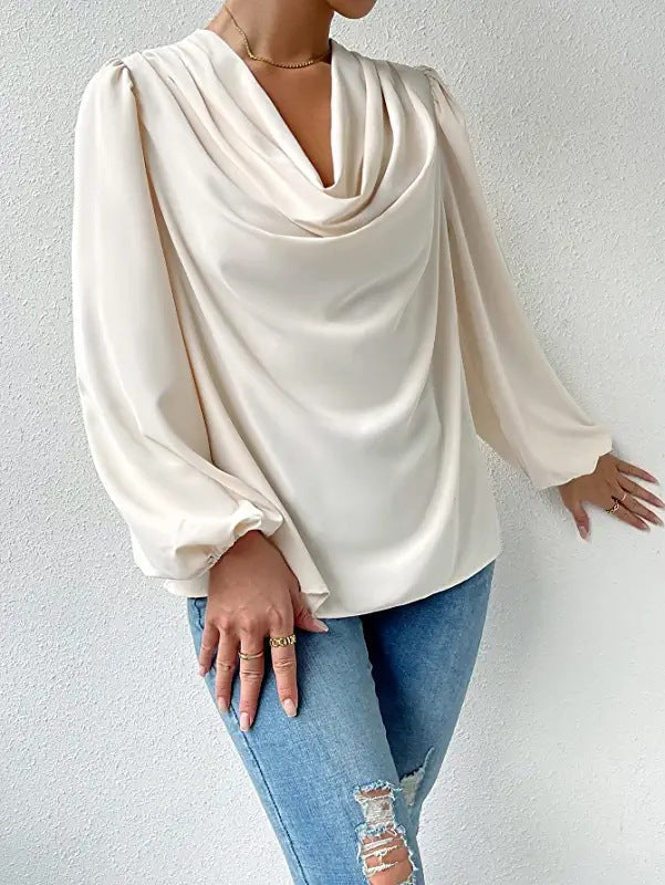 Bella Mia long-sleeved loose draped V-neck top for women, stylish casual shirt with relaxed fit and versatile design.