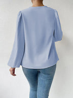 Bella Mia long sleeve loose draped V-neck top for women, stylish and comfortable casual shirt.