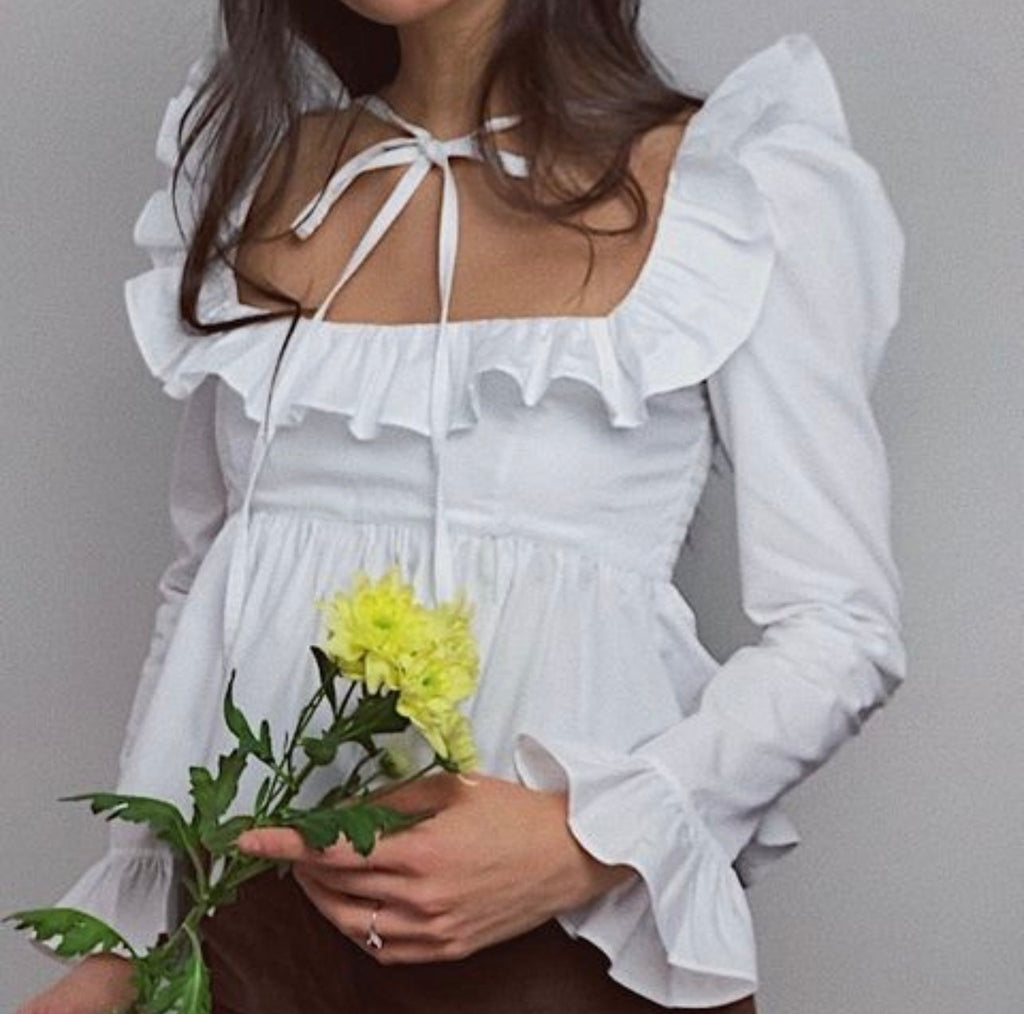 Bella Mia summer wind women’s solid color long sleeve ruffled shirt, stylish and lightweight top with feminine ruffle details.
