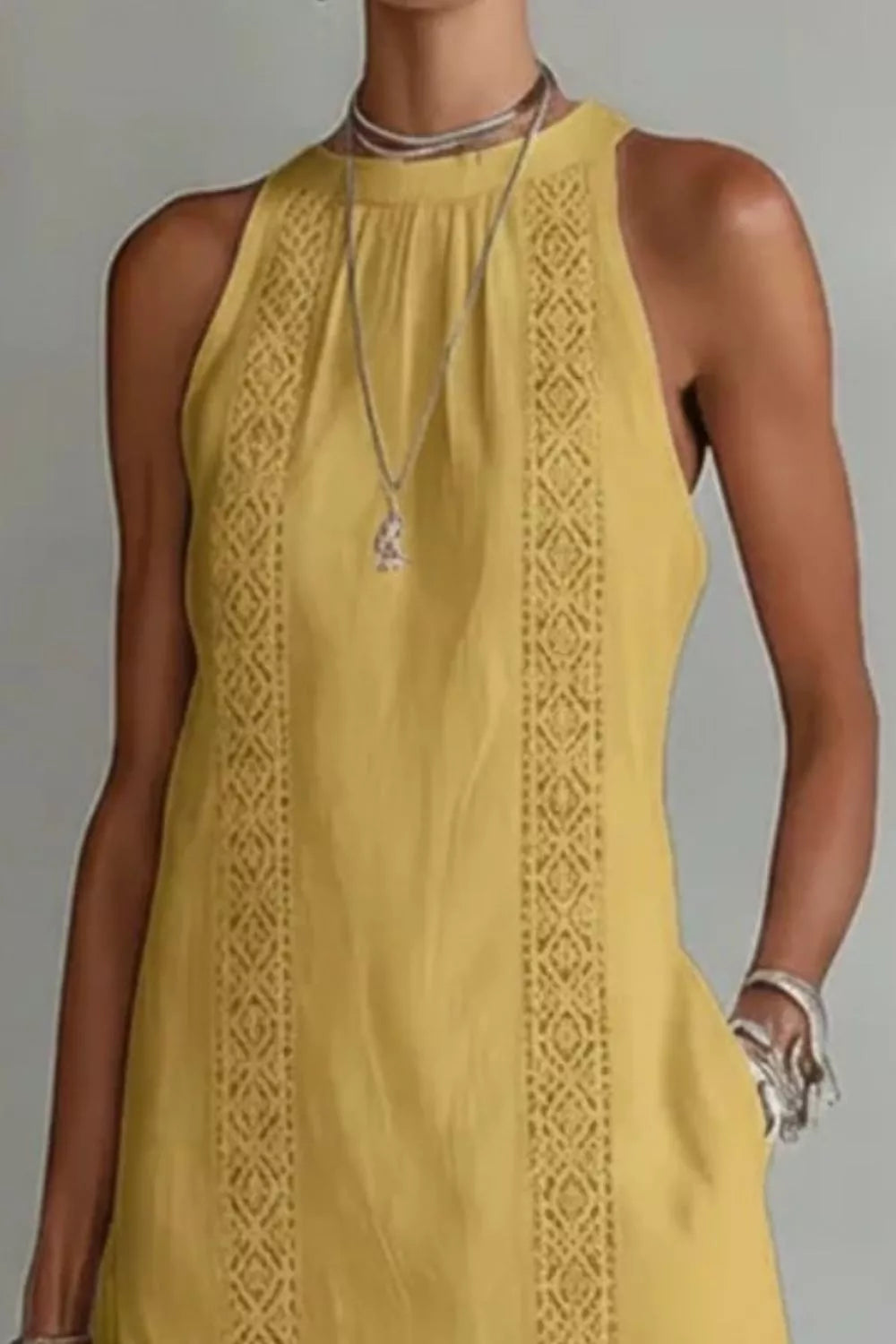 Women's sleeveless side slit maxi dress with pockets, flowing fabric and stylish design by Trendsi.