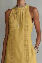 Women's sleeveless side slit maxi dress with pockets, flowing fabric and stylish design by Trendsi.