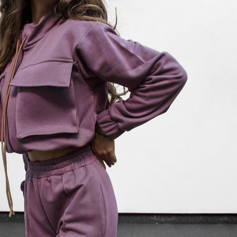 Bella Mia casual women's trousers and long sleeve top set with solid color, zipper double bag, and drawstring details.