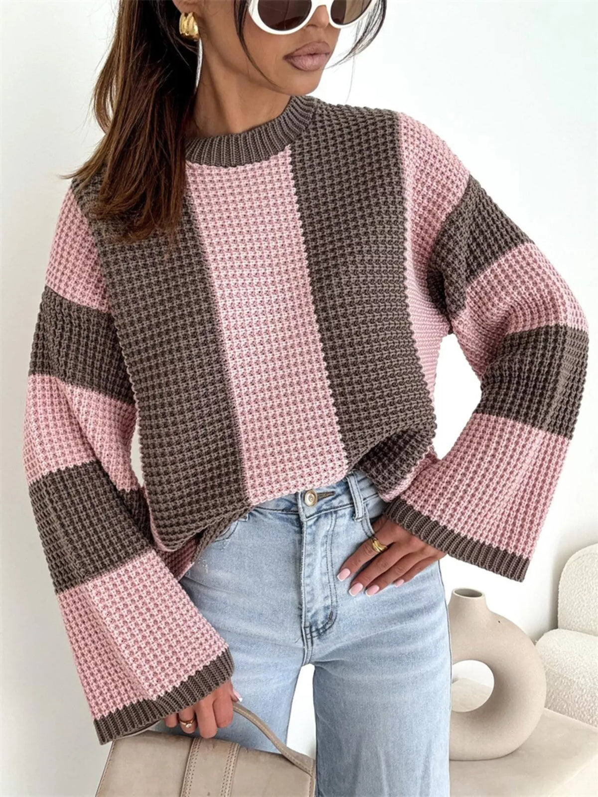 Color block long sleeve sweater by Trendsi featuring bold color panels and a cozy knit design.