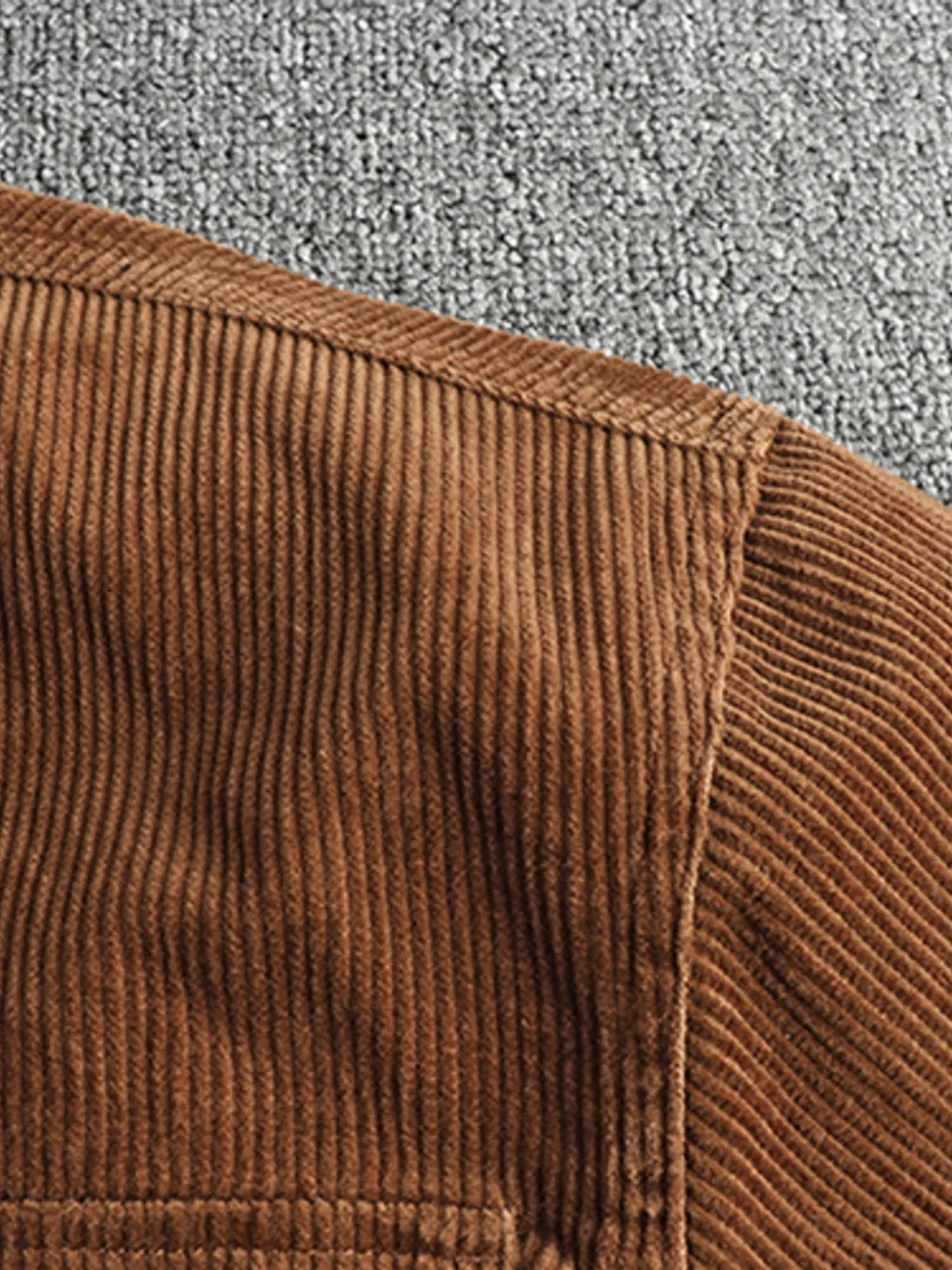 Men's plus size corduroy button-up long sleeve jacket by Trendsi, featuring a classic design and textured fabric.