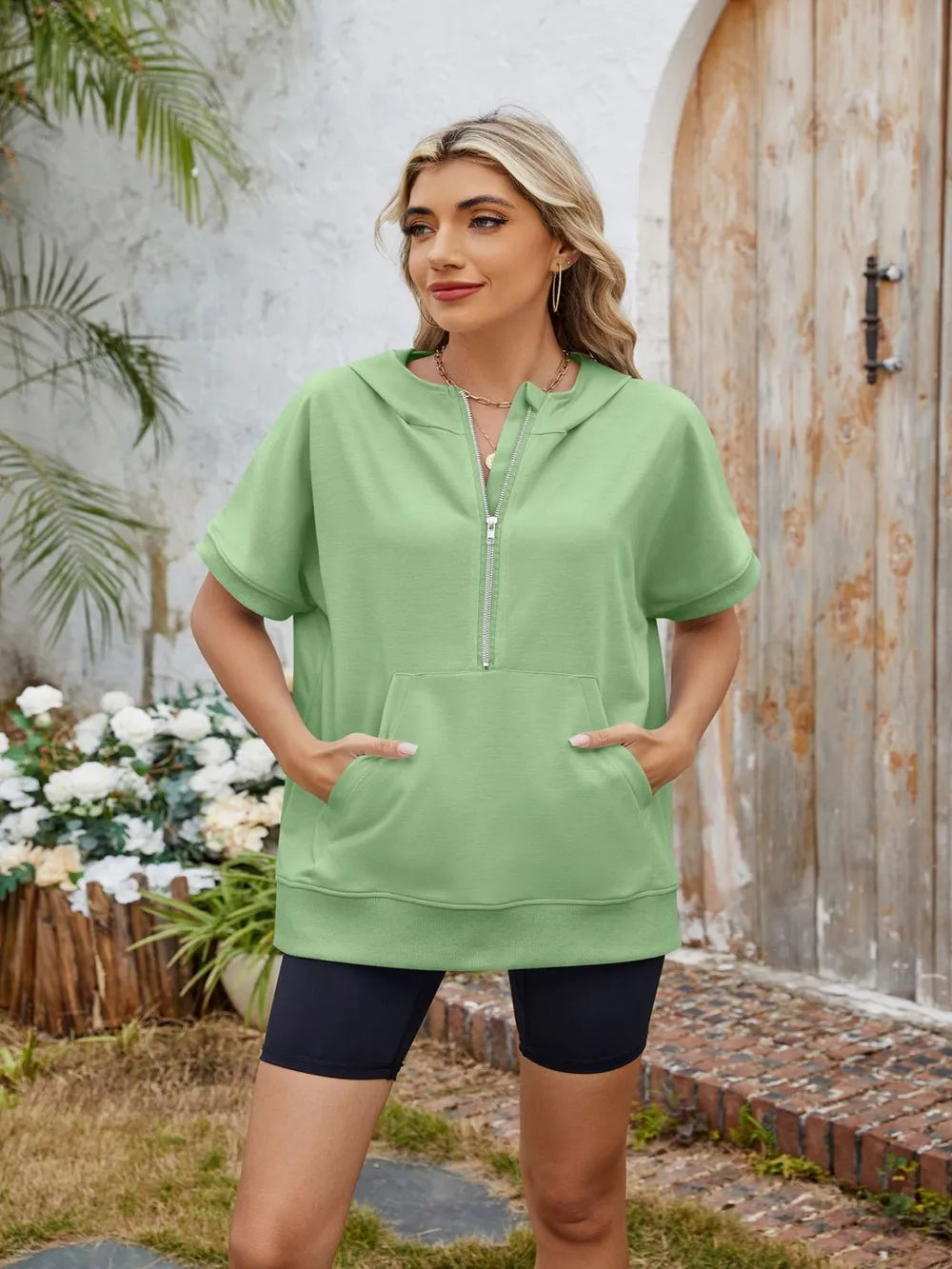 Plush Fashion Hub short sleeve hooded half zip top in soft fabric, featuring a hood, half zipper, and casual style.