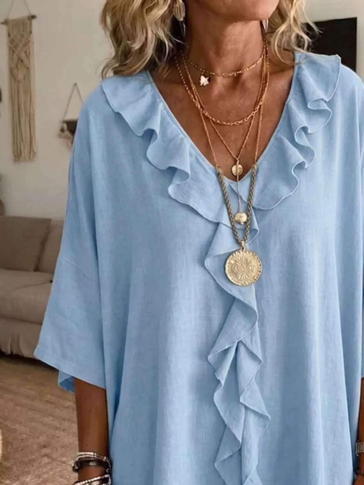 Plus size full ruffle v-neck blouse with 3/4 sleeves by Plush Fashion Hub, shown in a stylish, flowing design.