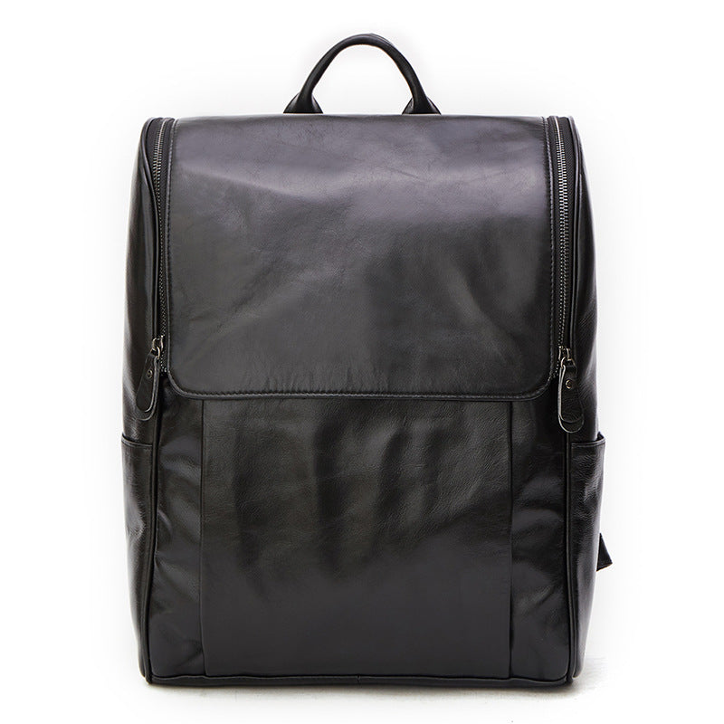 Black Pi-Mart leather computer backpack with a sleek first layer leather design, featuring multiple compartments and padded straps.