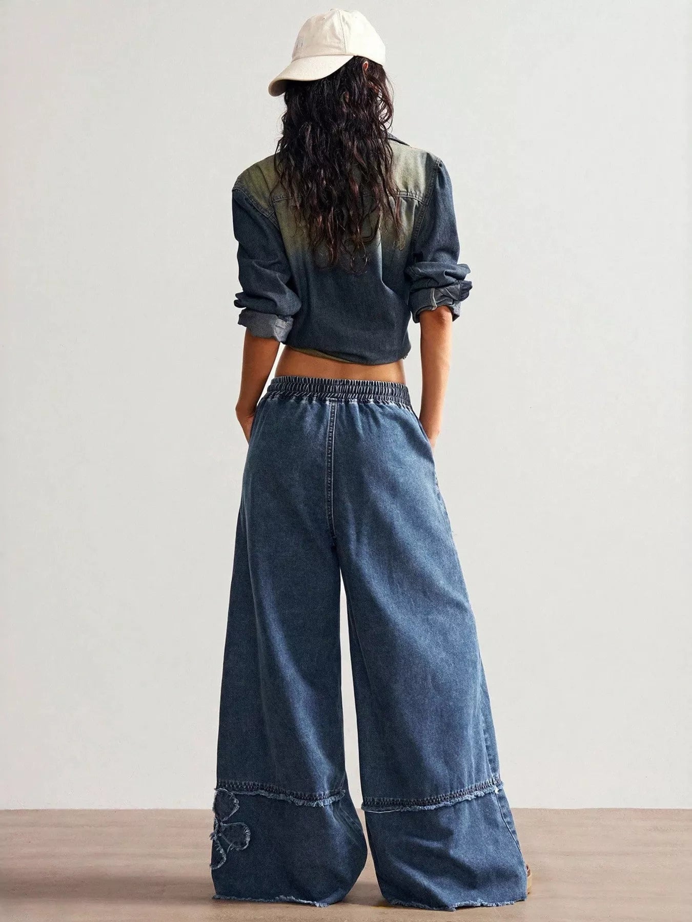 Shopimist floral appliques wide leg jeans with embroidered floral details and relaxed fit, showcasing stylish denim design.