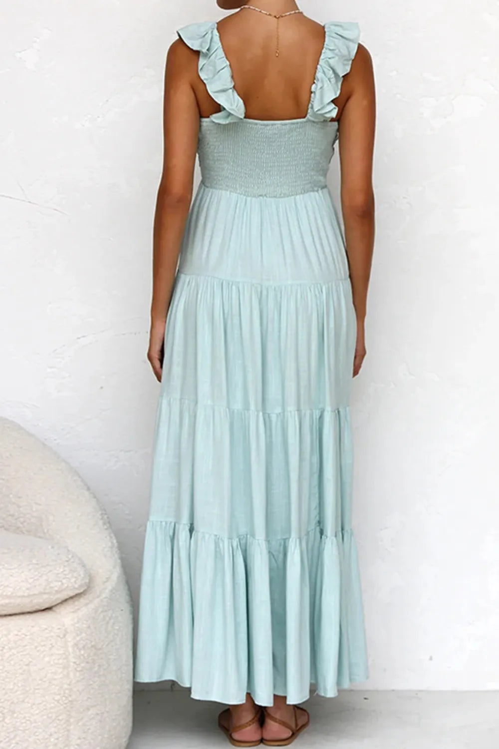 Women's cotton ruffled V-neck tiered midi dress with short sleeves and floral pattern, from Trendsi.