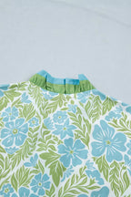 Floral print ruffle hem button-up mini dress from Trendsi showcasing a flattering fit and vibrant floral pattern.