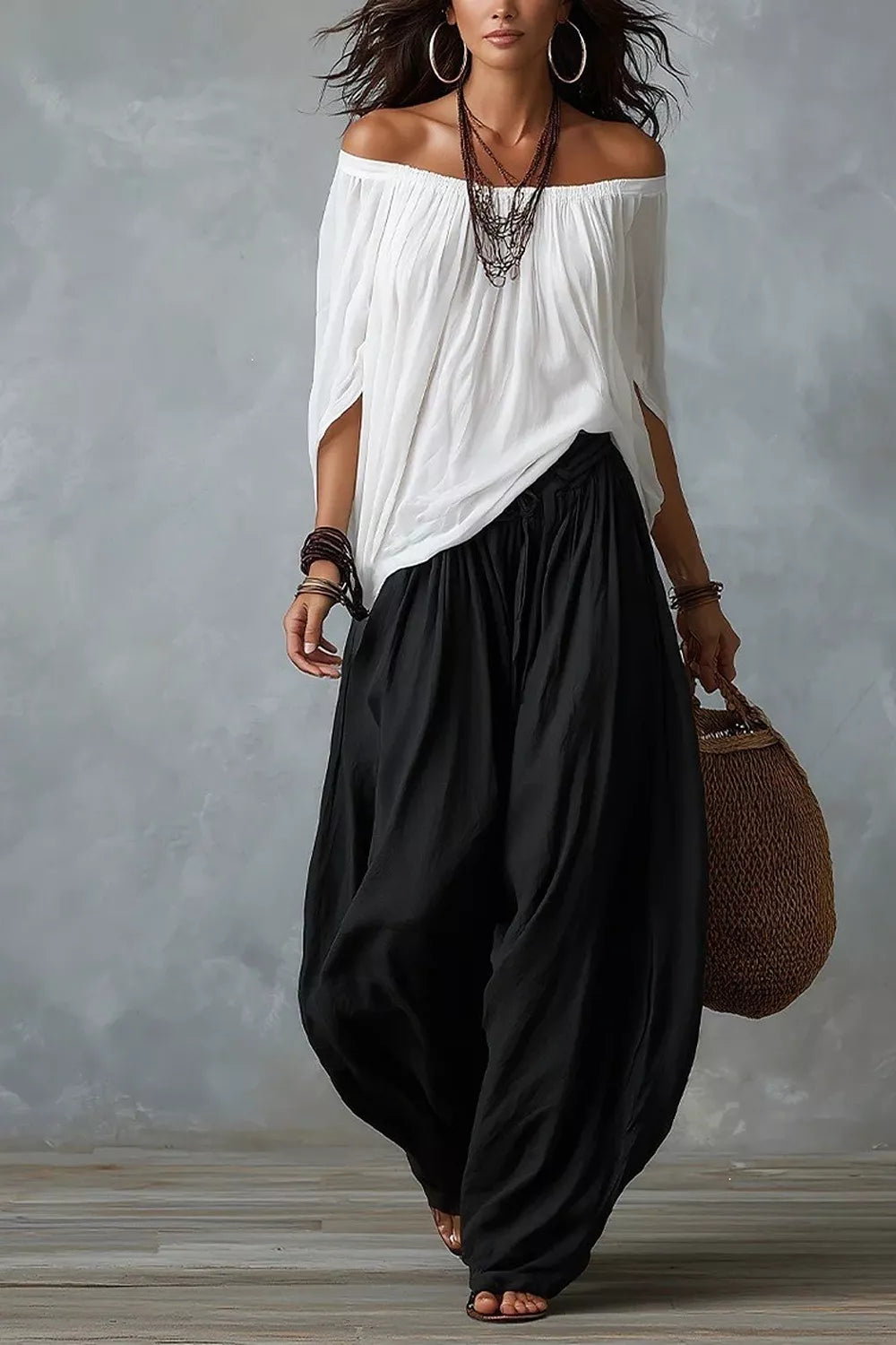 Plus size off-shoulder top and wide-leg pants matching set by Trendsi, featuring a stylish, comfortable fashion ensemble.