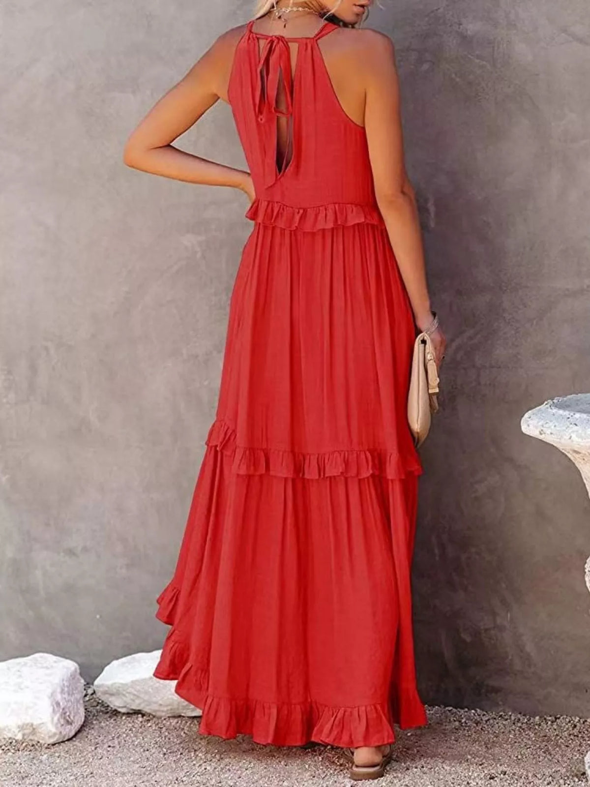 Plush Fashion Hub ruffled tiered sleeveless maxi dress with flowing fabric and layered design, perfect for summer occasions.