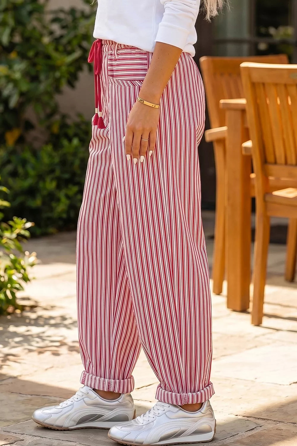 Light gray stripe drawstring casual loose pants from Trendsi, featuring a relaxed fit and adjustable waist with side pockets.