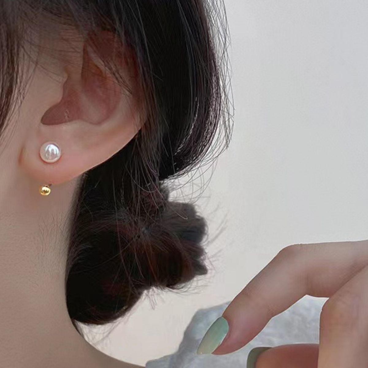 Sterling silver pearl stud earrings from Plush Fashion Hub featuring classic round white pearls and shiny silver posts.
