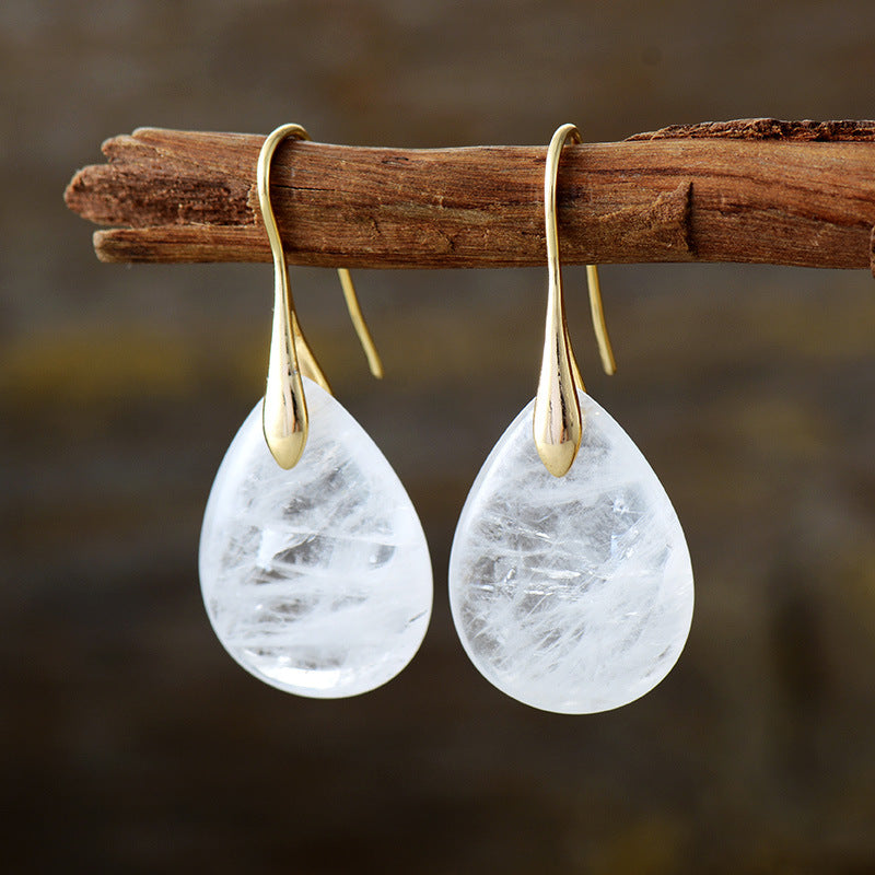 Elegant crystal dangle earrings from Plush Fashion Hub featuring sparkling crystal beads and silver hooks, perfect for stylish accessories.