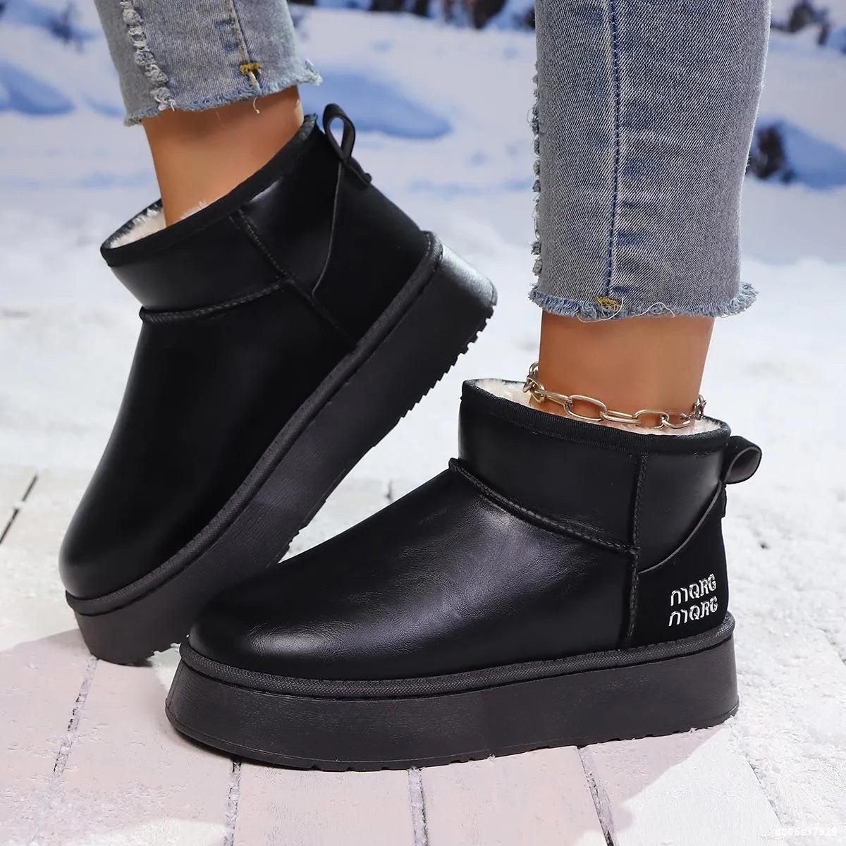 Faux-fur platform ankle boots by Trendsi featuring a stylish design and chunky heel for a fashionable winter look.