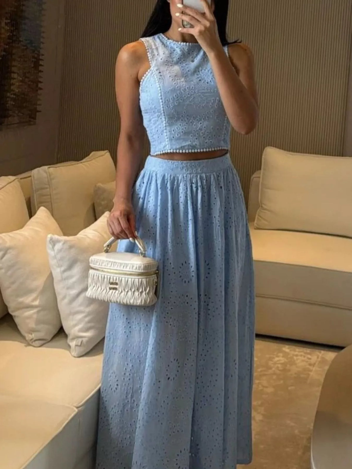 Plush Fashion Hub eyelet crop top and matching maxi skirt set, stylish and trendy for summer wear, shown on a model.