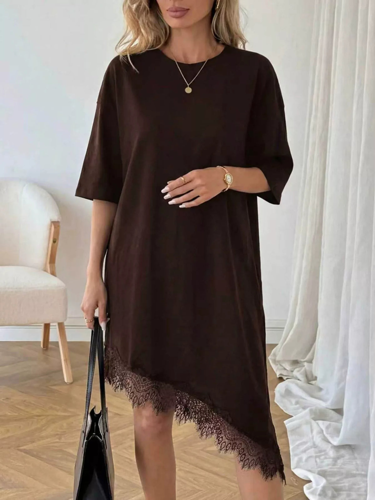 Plush Fashion Hub lace trim asymmetrical hem T-shirt dress featuring a casual shirt dress design with decorative lace details.