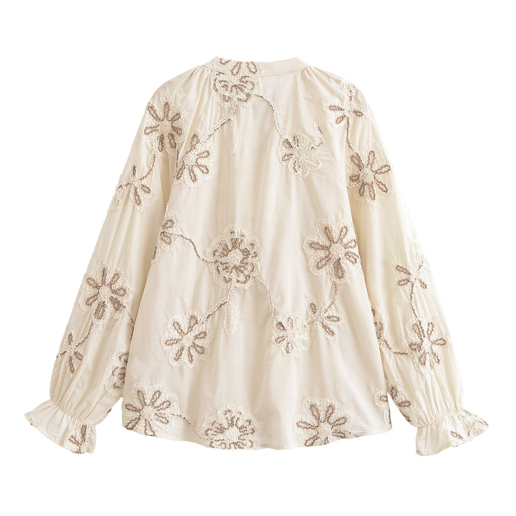 Bella Mia women's spring floral embroidered mini shirt with delicate ring accents, perfect for stylish spring outfits.