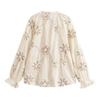 Bella Mia women's spring floral embroidered mini shirt with delicate ring accents, perfect for stylish spring outfits.