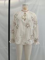 Bella Mia women's spring floral embroidered mini shirt with delicate ring accents, perfect for stylish spring outfits.