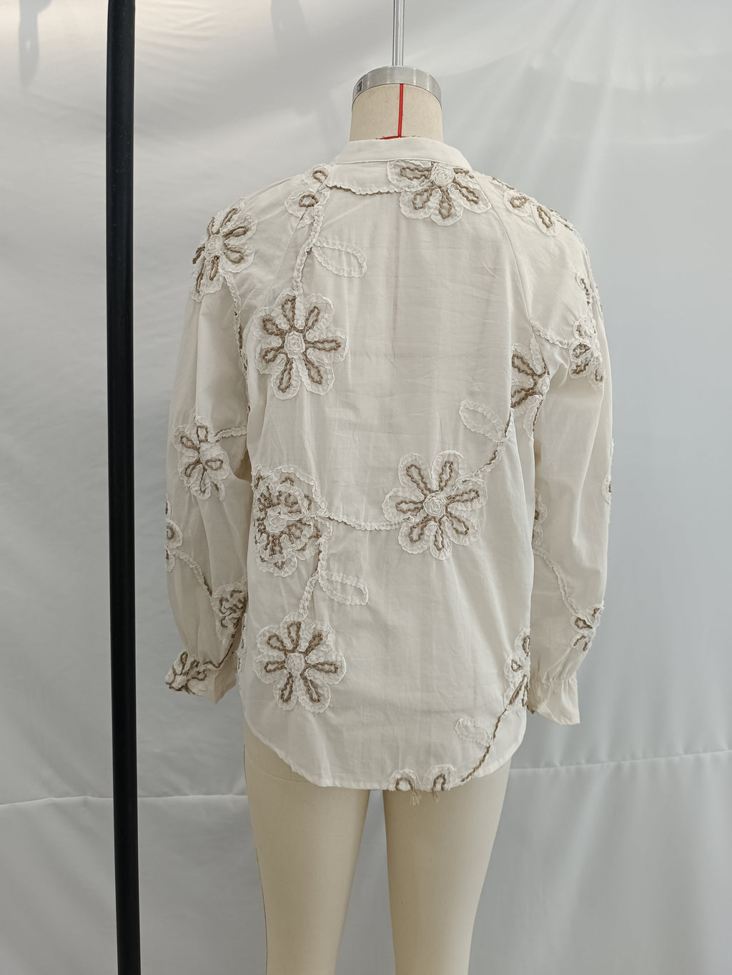 Close-up of Bella Mia floral embroidered mini shirt for women, featuring spring-inspired sweet floral design.