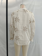 Close-up of Bella Mia floral embroidered mini shirt for women, featuring spring-inspired sweet floral design.