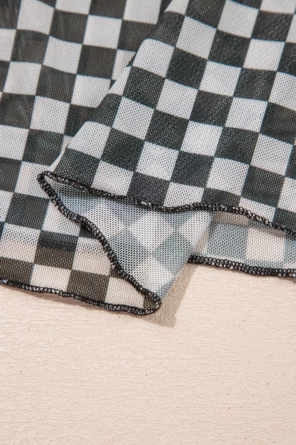 Plaid stand neck long sleeve mesh top by Plush Fashion Hub, featuring a stylish plaid pattern and sheer mesh fabric.