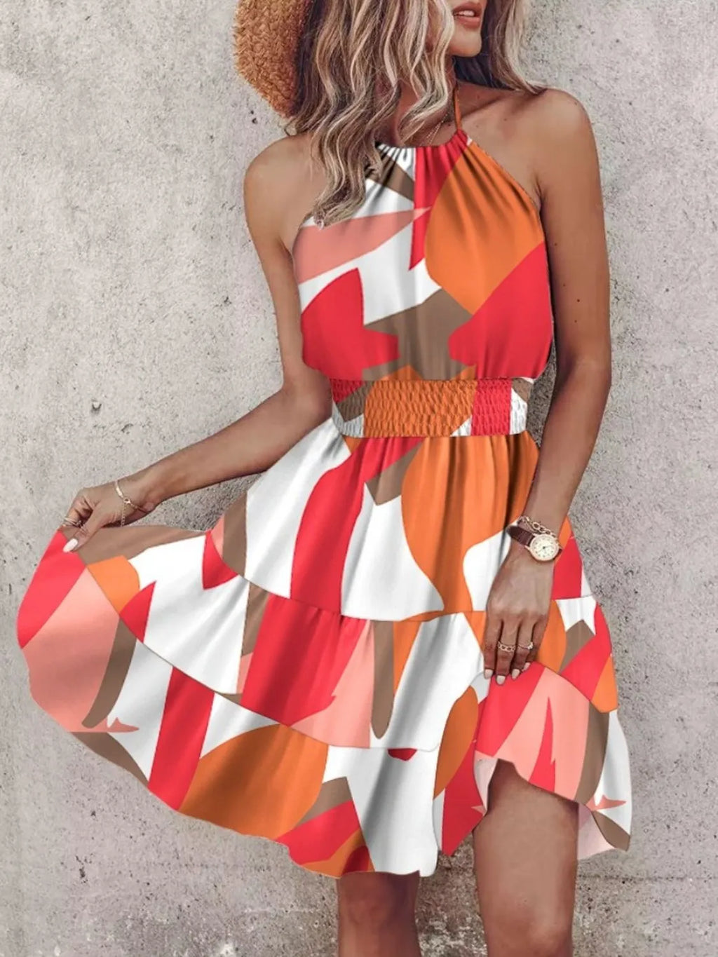 Paisley print halter neck mini dress by Plush Fashion Hub, featuring a stylish sleeveless design and vibrant pattern.