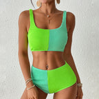 Women’s high waist bikini swimwear by Bella Mia featuring a solid color, sexy split design perfect for beach or pool.