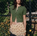 Bella Mia women's short sleeve knitwear with a round neck and single-breasted design, suitable for early autumn office wear.