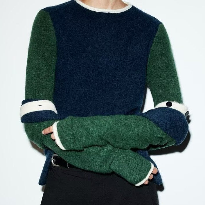 Women wearing Bella Mia casual loose contrast color knitwear outerwear, showcasing relaxed fit and stylish knit pattern.