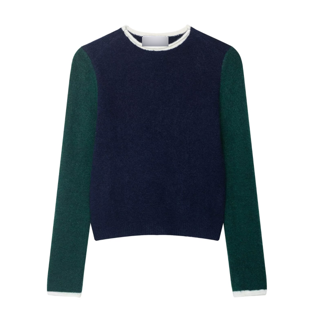 Women’s loose contrast color knitwear outerwear by Bella Mia, casual and stylish with a relaxed fit and vibrant color blocks.