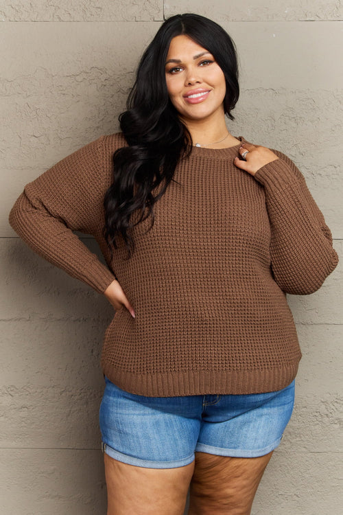 Plus size Zenana Breezy Days waffle knit sweater with high-low hem, casual and comfortable knitwear by Trendsi.