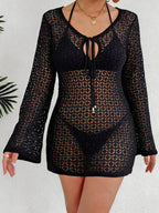 Women’s long sleeve see-through beach cover-up dress with cutout and tie details, perfect for beachwear by Plush Fashion Hub.