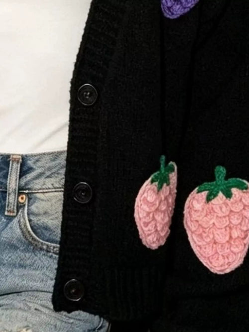 Plus size knit cardigan with colorful fruit applique, trendy knitwear from Trendsi, featuring a full-size, cozy and stylish design.