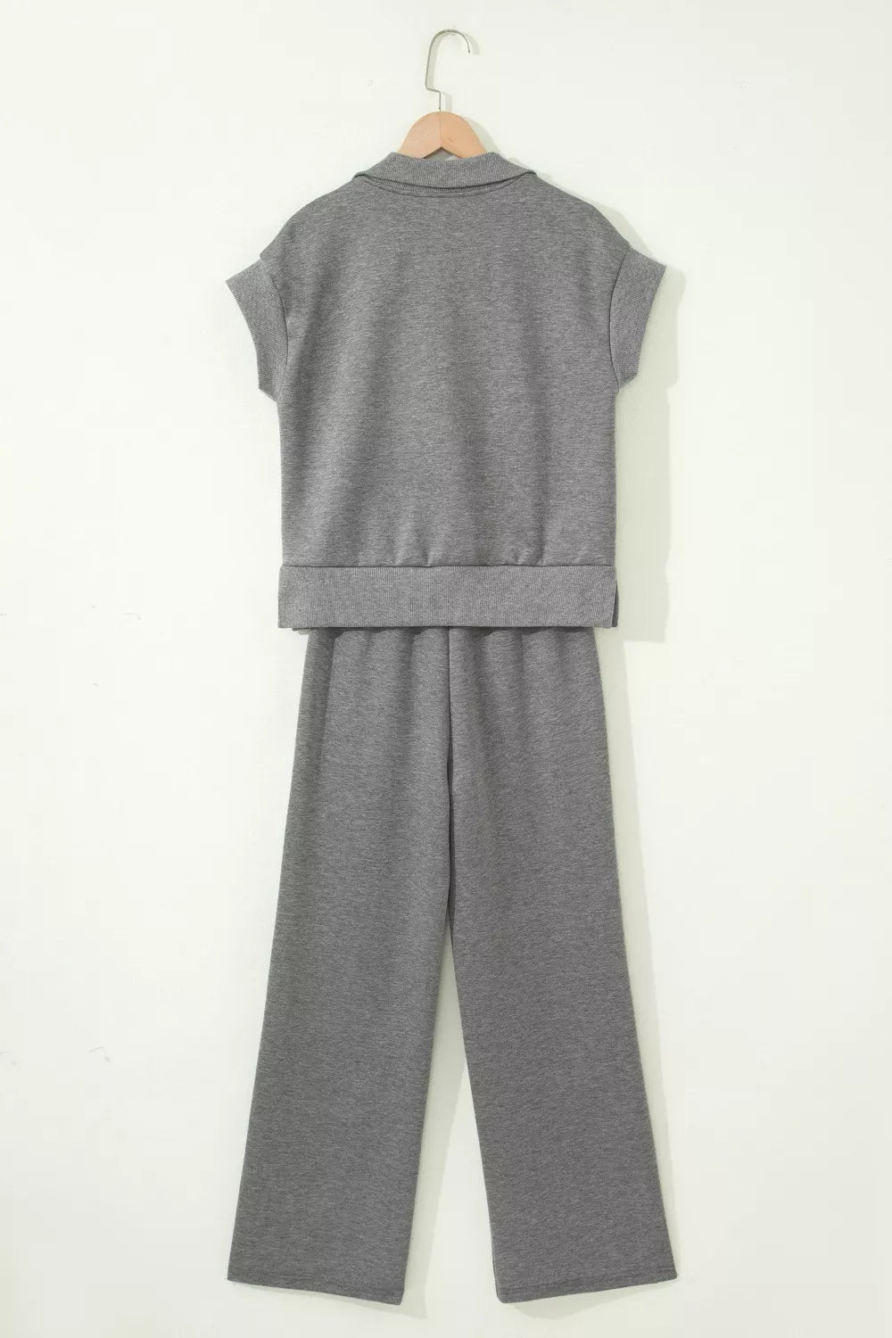 Casual men's Half Zip Polo Tee and pants set by Plush Fashion Hub, featuring a relaxed fit with a half-zip collar and comfortable fabric.