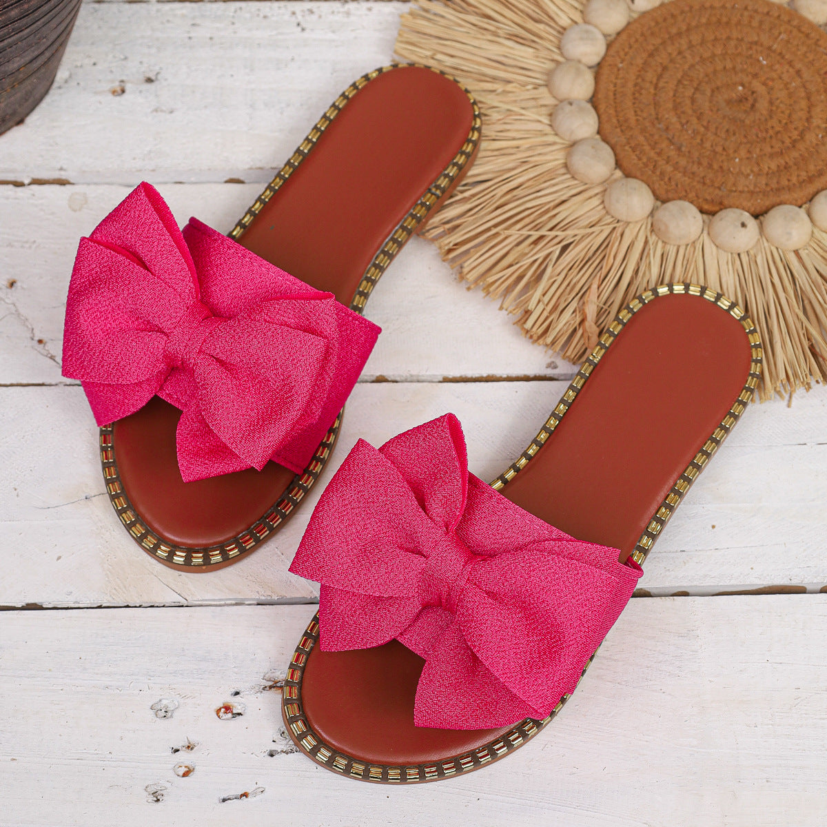 Plush Fashion Hub bowknot embellished flat sandals with open toe design and comfortable straps.