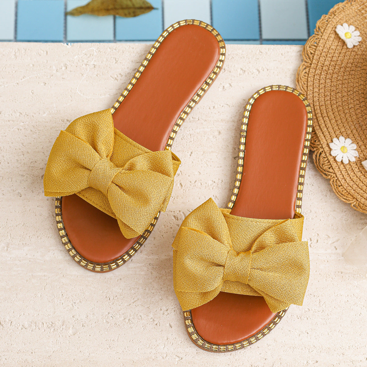 Plush Fashion Hub bowknot embellished flat sandals with open toes and straps, stylish and comfortable footwear for warm weather.
