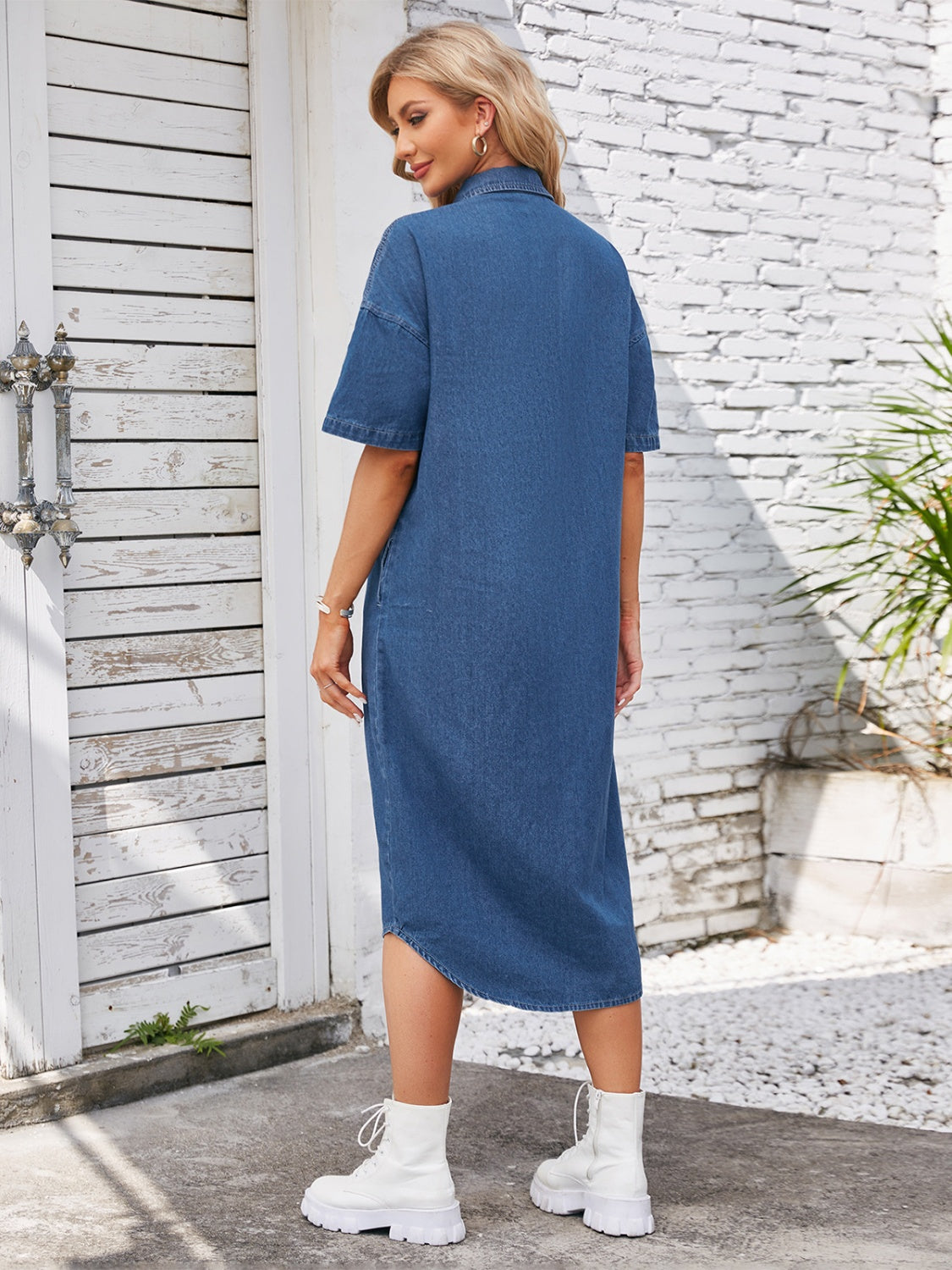 Denim button-up dropped shoulder dress by Plush Fashion Hub featuring long sleeves and a relaxed fit.
