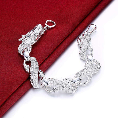 Unisex white dragon braceletExperience the powerful energy and elegance of our Unisex White Dragon Bracelet. Crafted from environmentally-friendly copper and electroplated with 925 silver, the BraceletPlush Fashions ShopPlush Fashion Shop