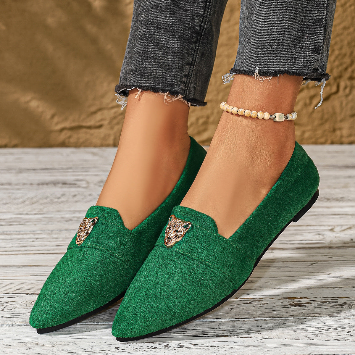 Point toe slip-on footwear by Trendsi, sleek black shoes with a smooth finish and comfortable fit, perfect for stylish casual wear.