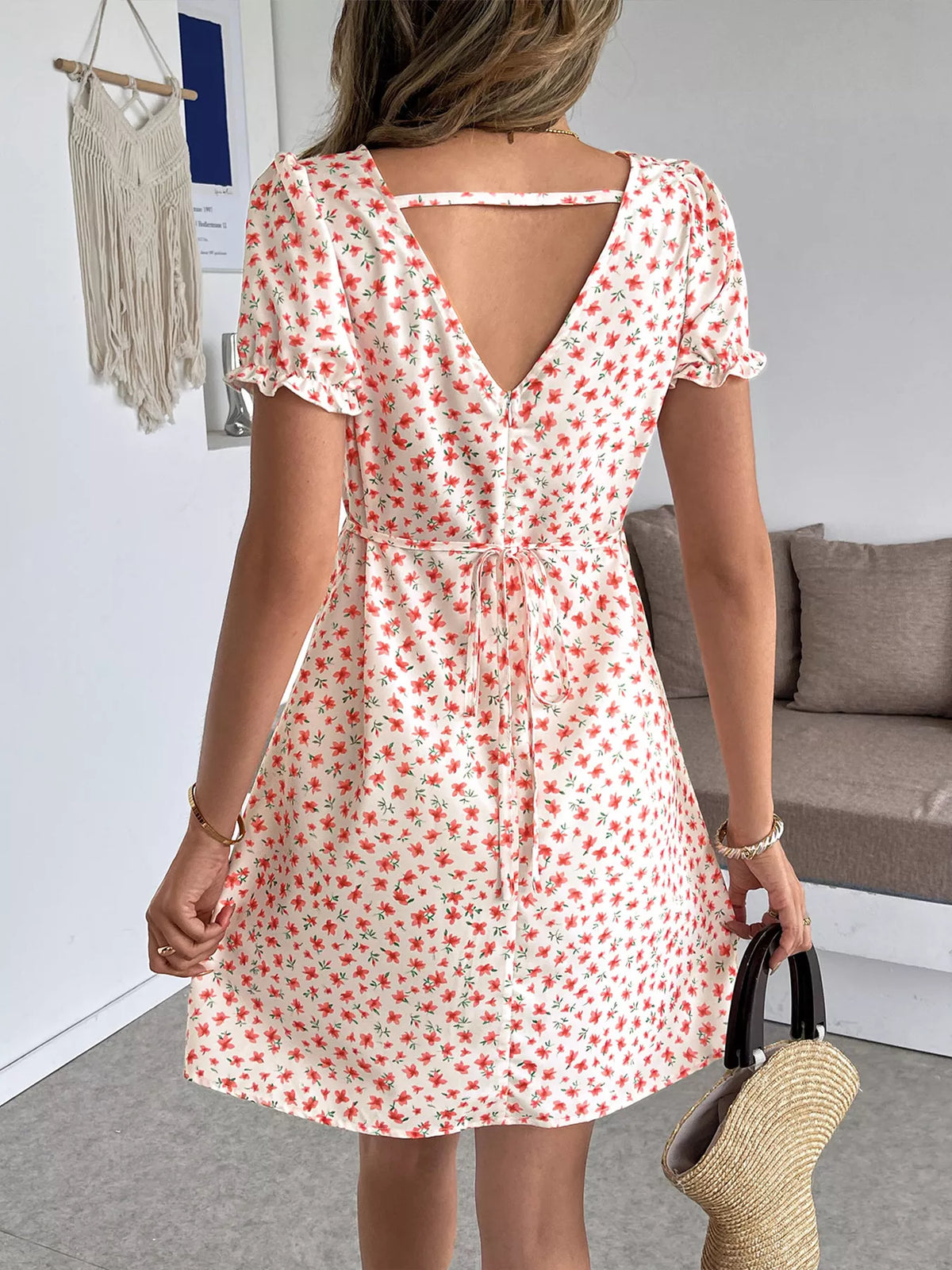 Floral print V-neck puff sleeve mini summer dress for women by Plush Fashion Hub, showing a stylish lightweight dress with a vibrant floral pattern.