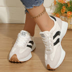 Women's round toe lace-up flat casual sneakers by Trendsi, made of comfortable PU leather with a stylish, everyday design.