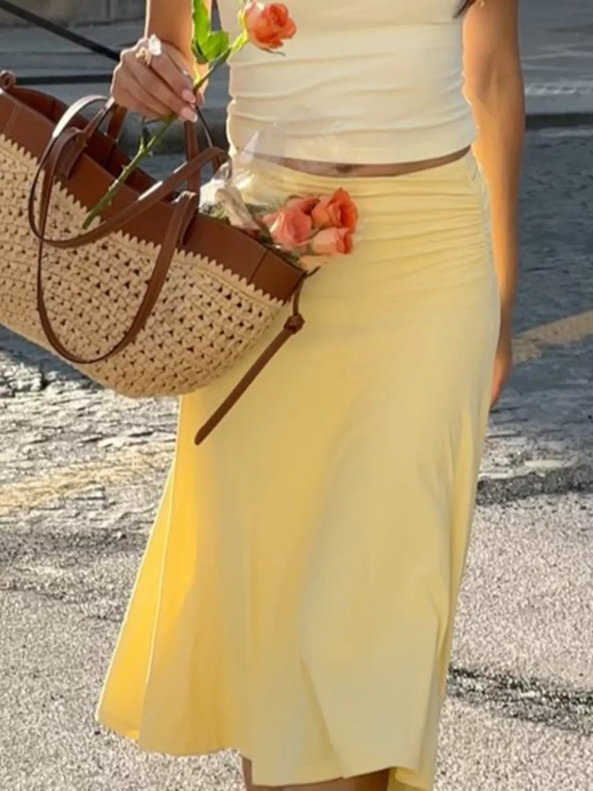 Flowy ruched waist skirt from Trendsi, featuring a lightweight fabric and gathered design, perfect for casual or dressy wear.