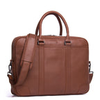 Pi-Mart multifunctional leather men's business briefcase with multiple compartments and sturdy handles, suitable for professional use.
